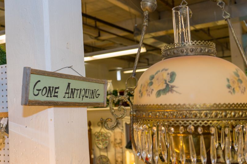 photo of sign saying Gone Antiqueing